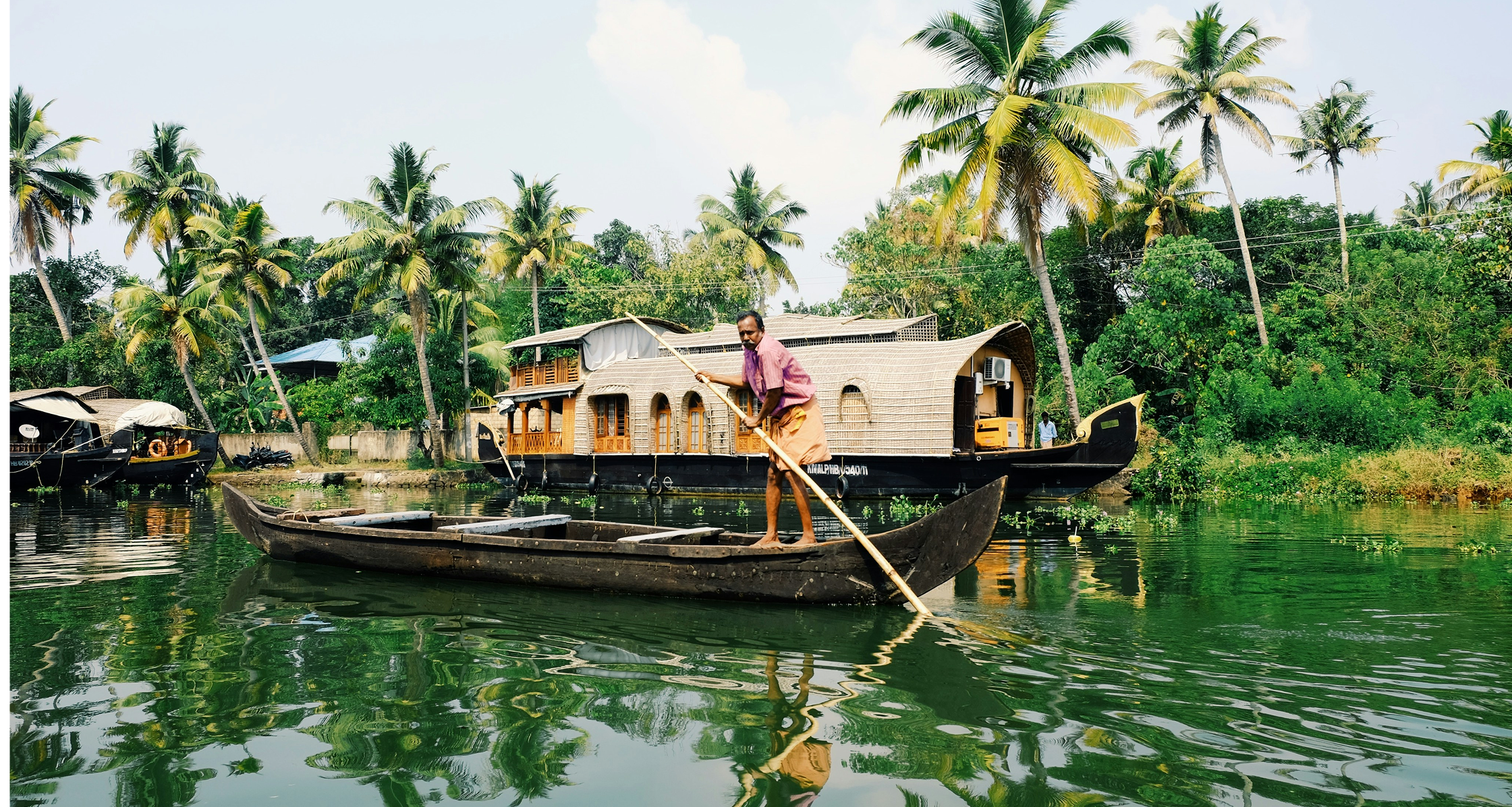 Kerala backwaters with traditional houseboat - India eVisa FAQ support and guidance